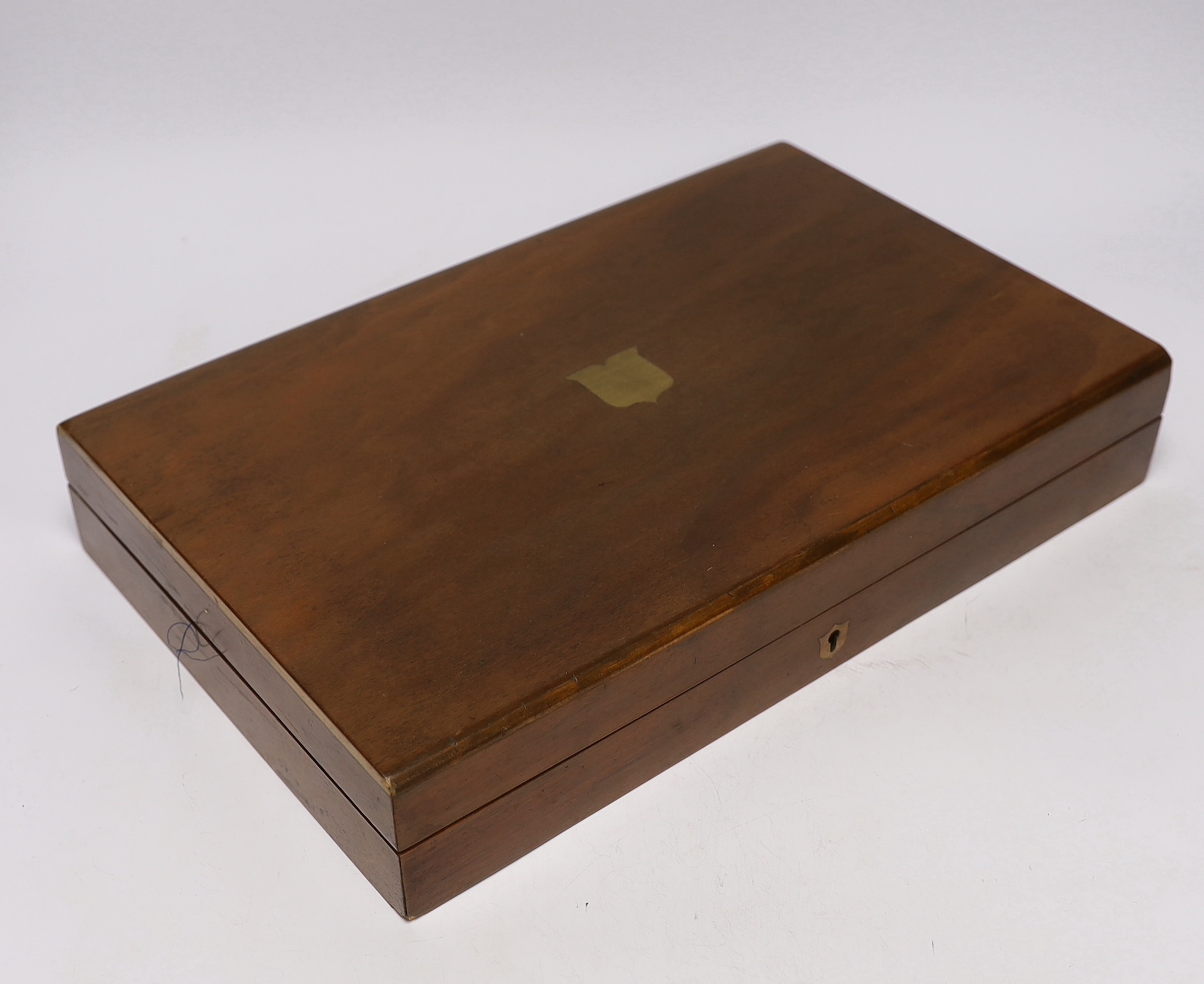 Two mahogany boxes of gun tools, including; bullet moulds, files, a vice, musket balls, etc.